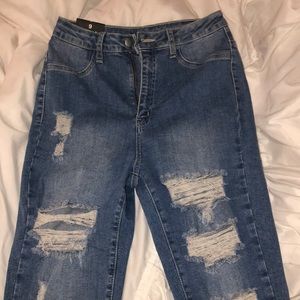 medium blue wash distressed skinny